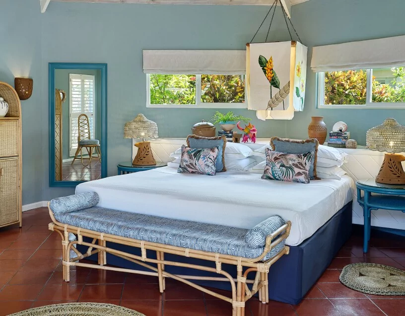 Luxurious beachfront cottage at East Winds Resort, St. Lucia, featuring tropical decor and serene atmosphere, all inclusive